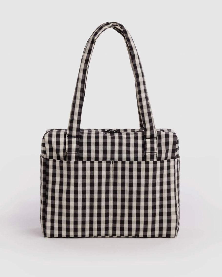 A black and white gingham checkered tote bag with two shoulder straps, shown against a plain light gray background.