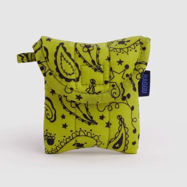 A lime green quilted pouch with a black paisley pattern and a small blue brand tag reading PACEQU, shown on a light gray background.