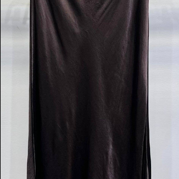 Brown skirt on a hanger Stay cool and stylish all day with its lightweight and smooth texture.
