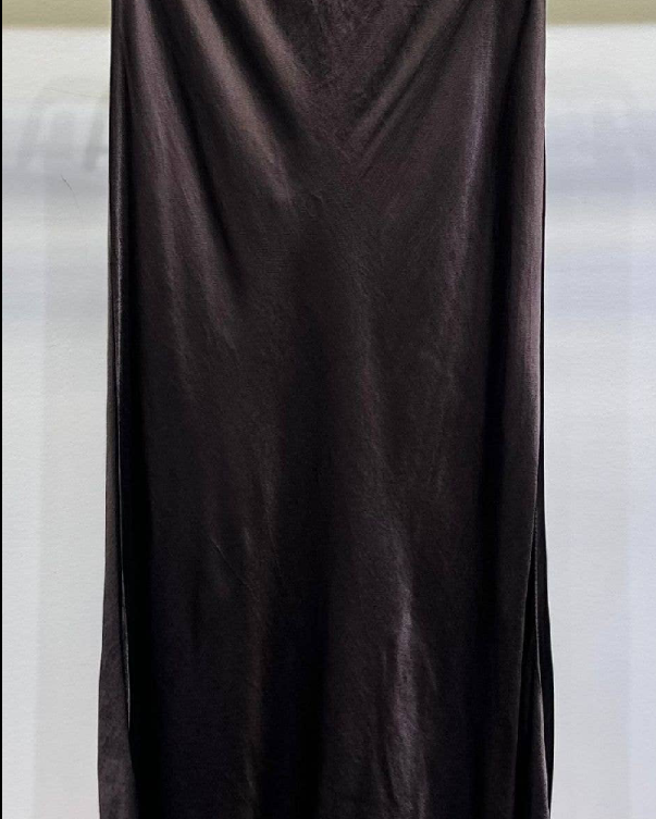 Brown skirt on a hanger Stay cool and stylish all day with its lightweight and smooth texture.
