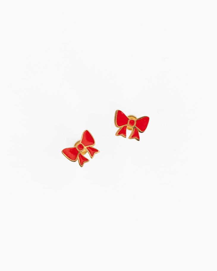 Red bow-shaped earrings on a white background