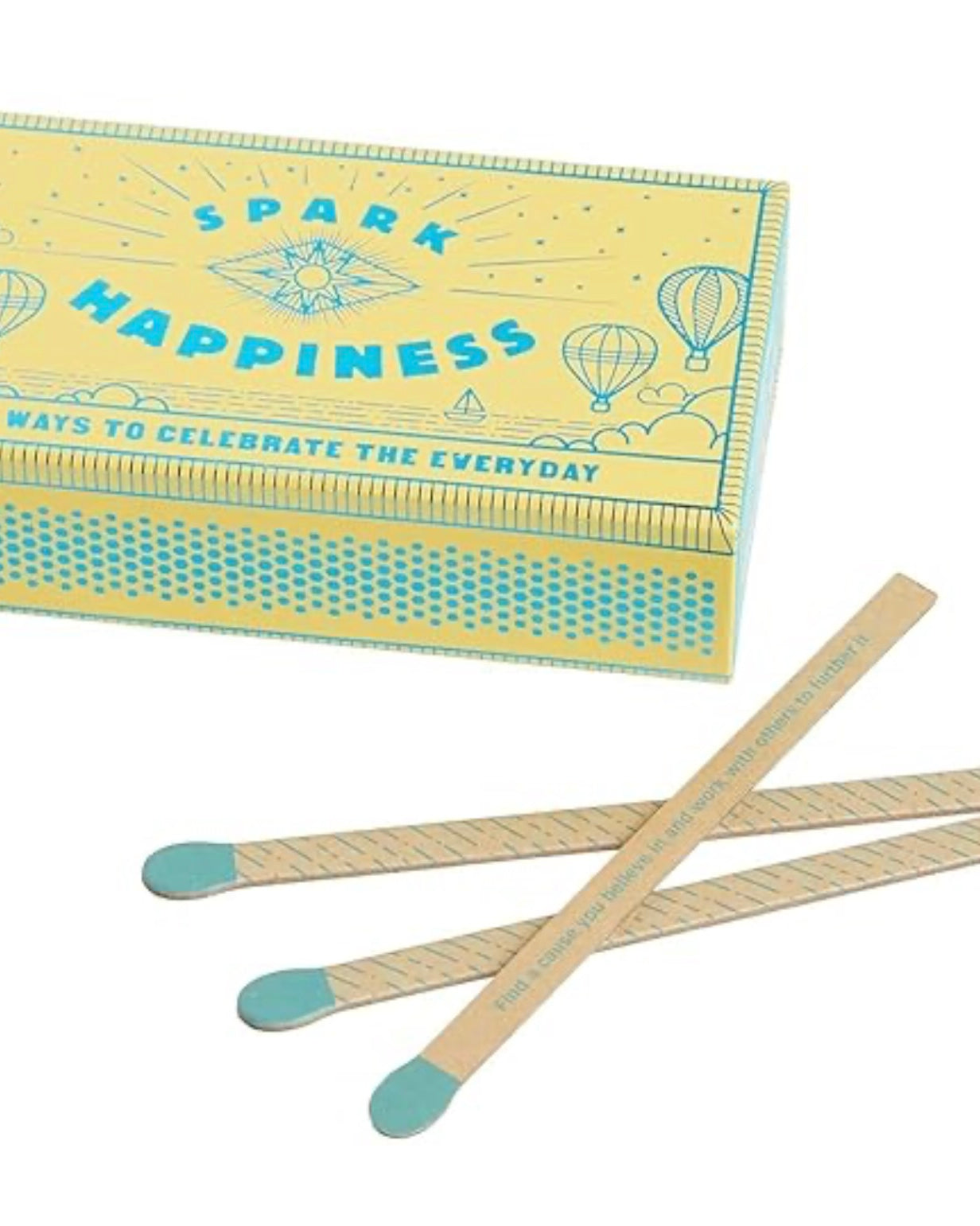 Spark Happiness box with illustrated matchstick-style strike pattern.