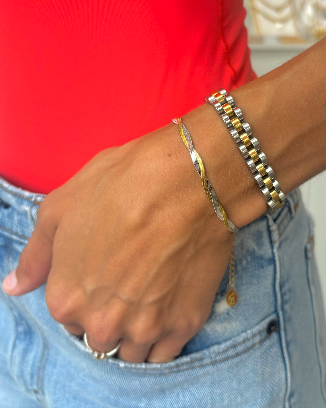 Woman wearing Waterproof silver and gold Cuban Link bracelet 6" plus a 2" extender