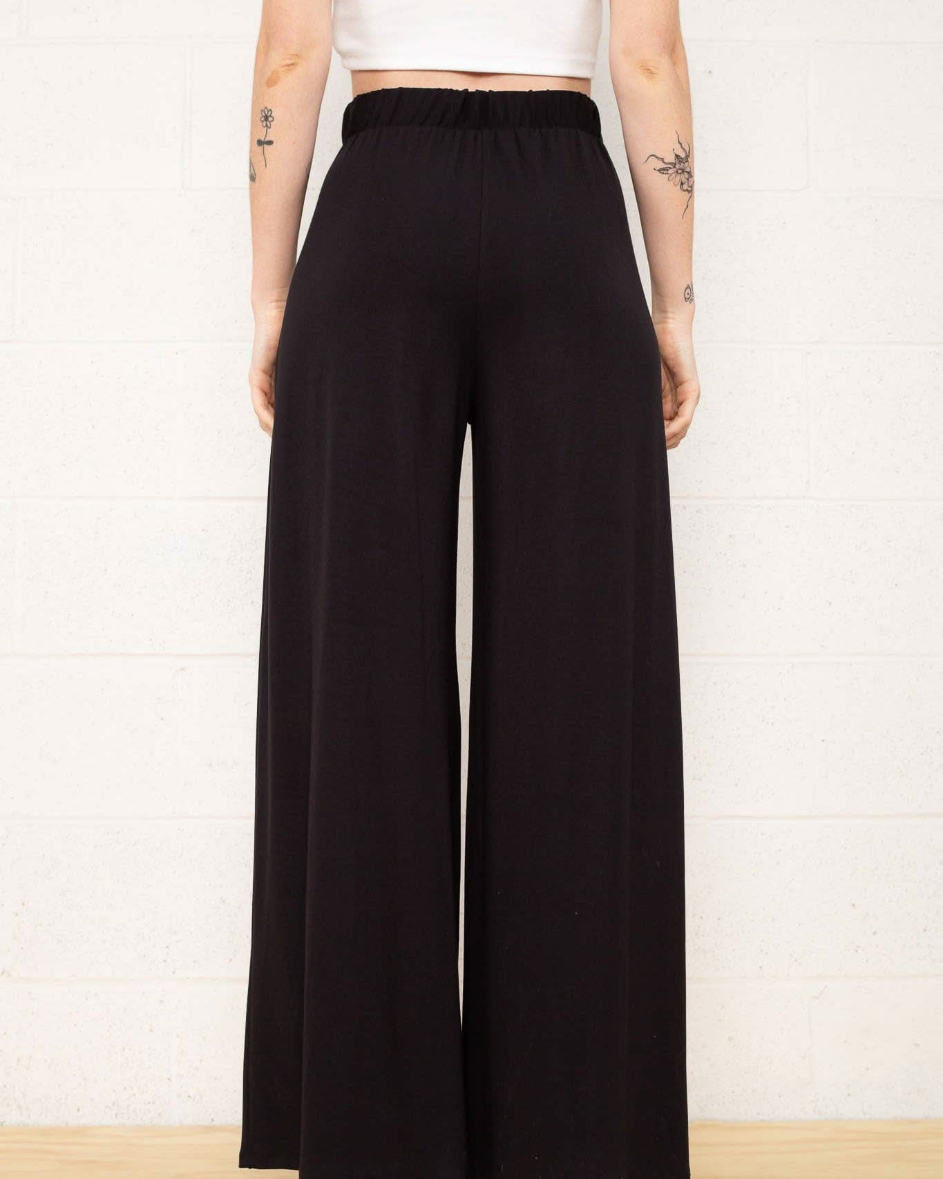 its versatile wide leg cut and easy care instructions, it's an essential addition to your closet.