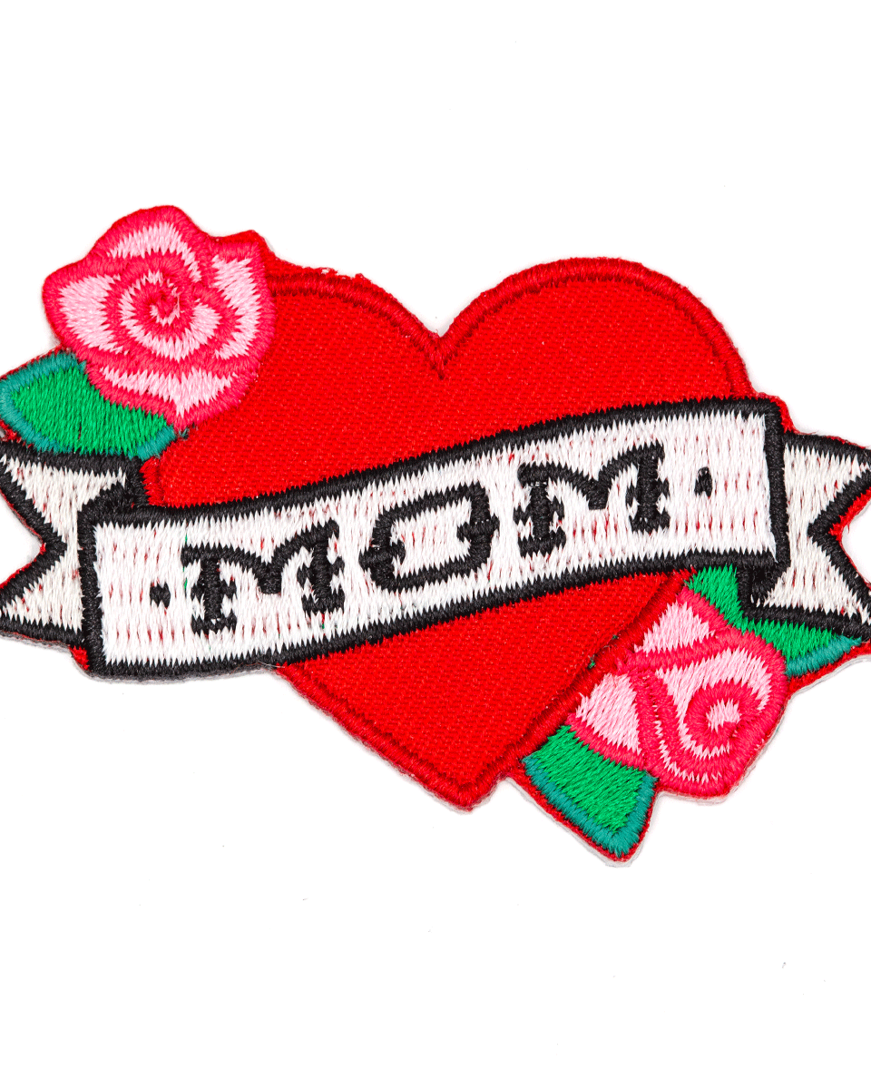 Heart-shaped patch with 'Mom' banner and roses on a white background