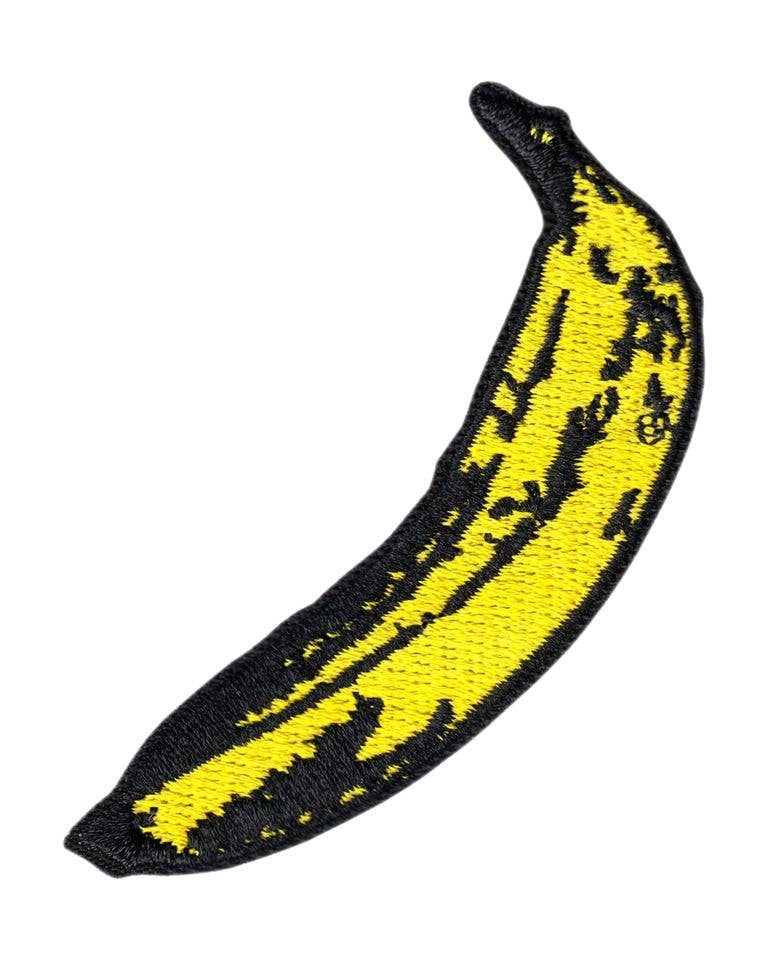 Yellow banana with black outline on a white background