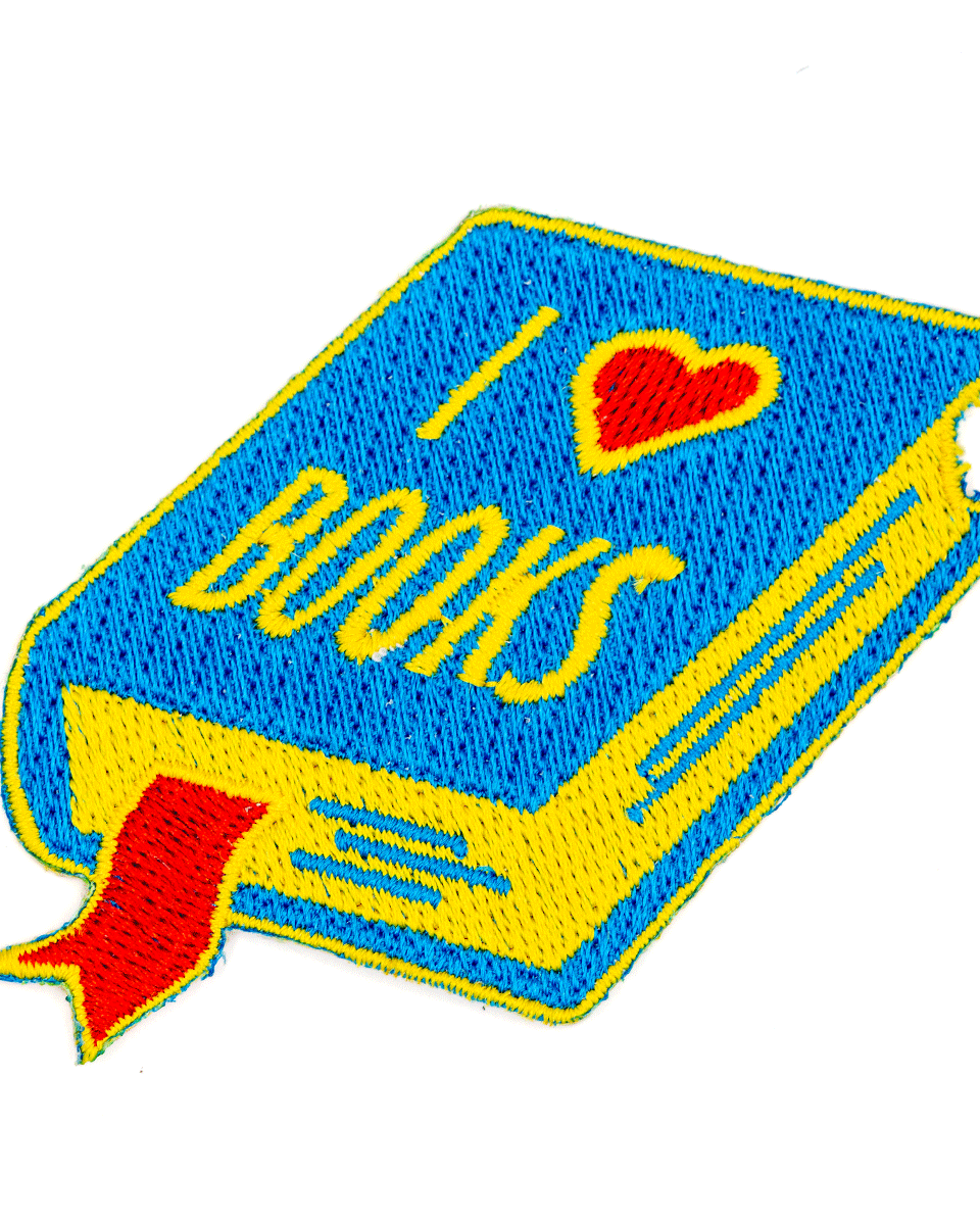 Embroidered patch of a book with 'I ❤️ Books' text on a white background