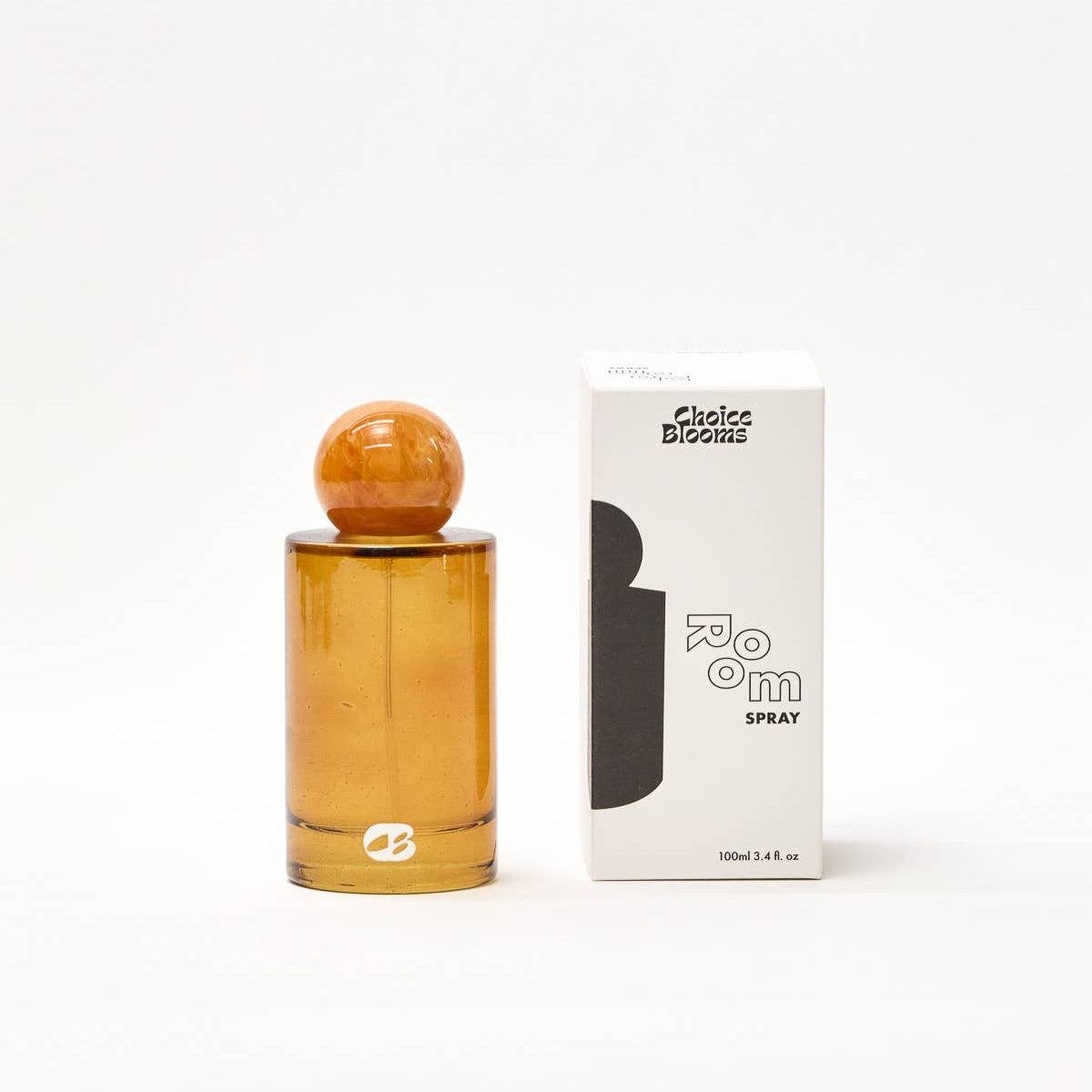 Amber perfume bottle with wooden cap and packaging on a white background