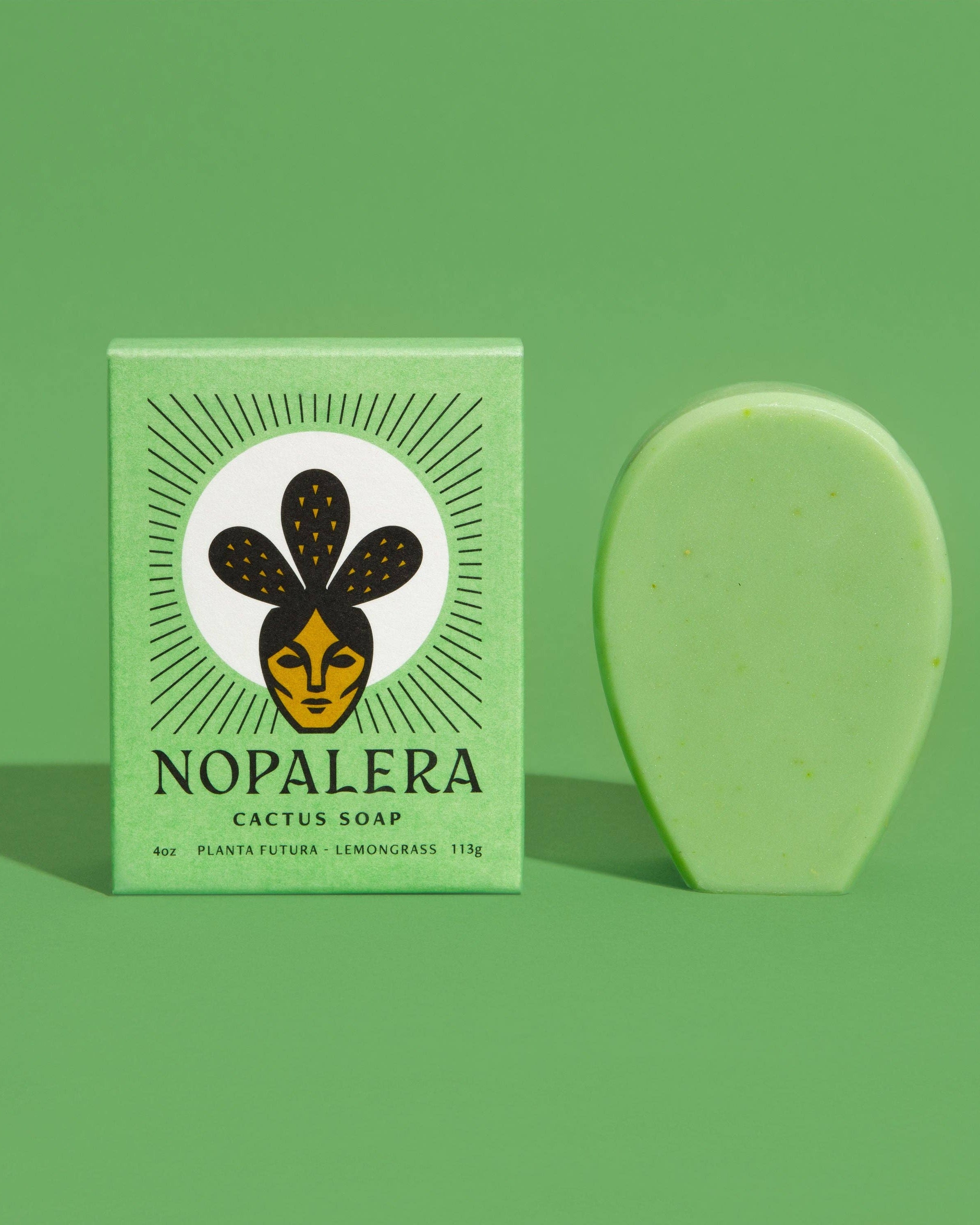 Nopalera cactus soap bar and packaging on a green background