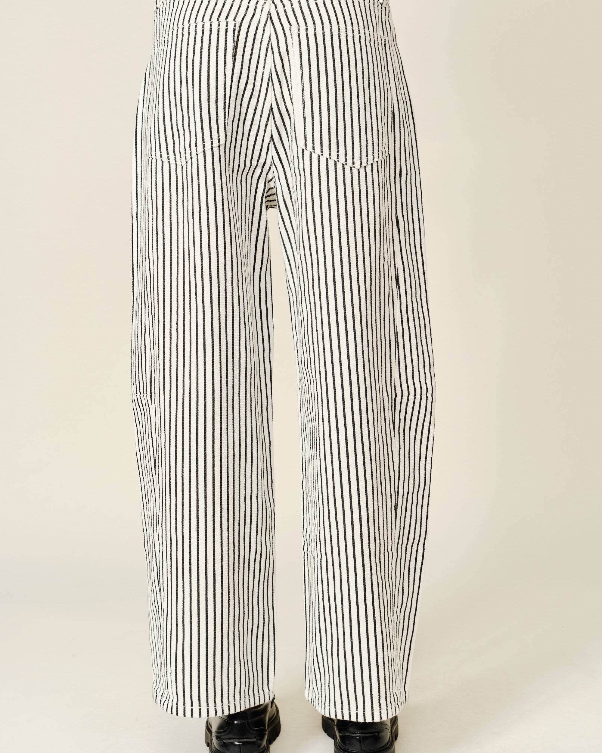 Black and white striped pants on a plain background