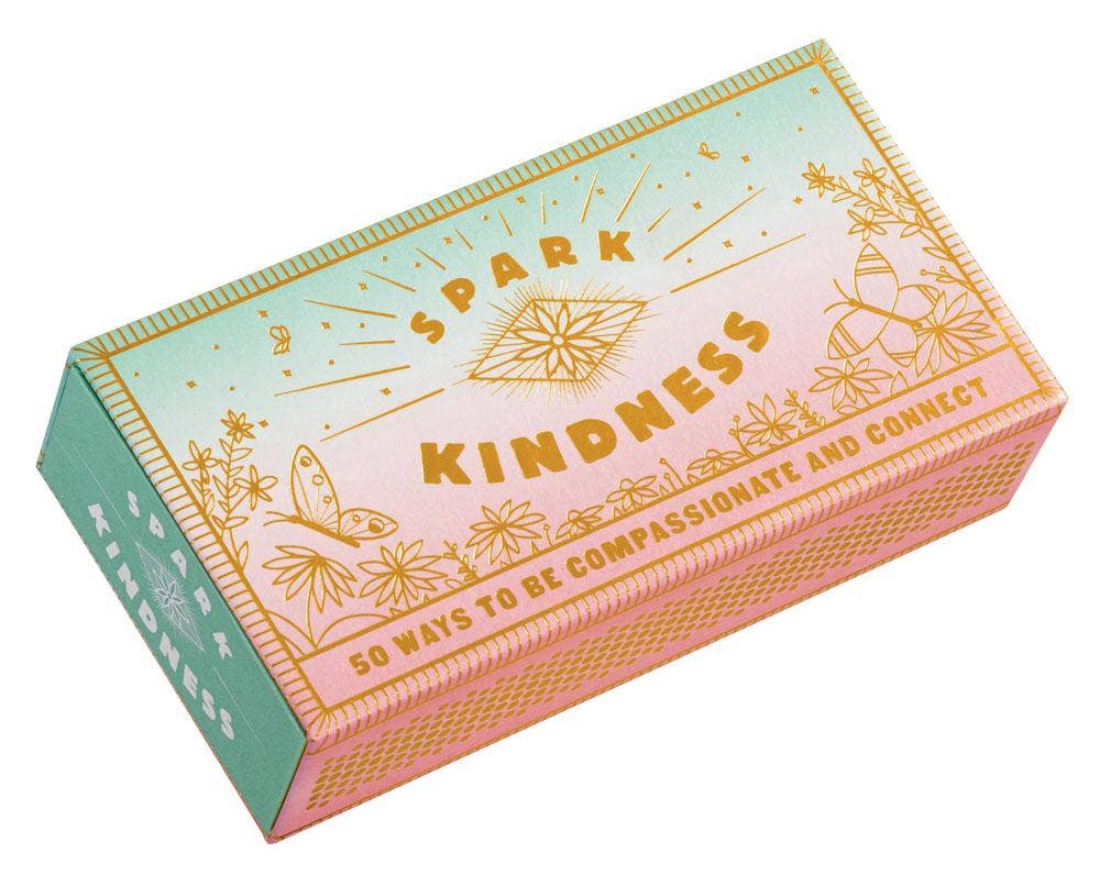 Box of 'Spark Kindness' cards with decorative design and text on a white background