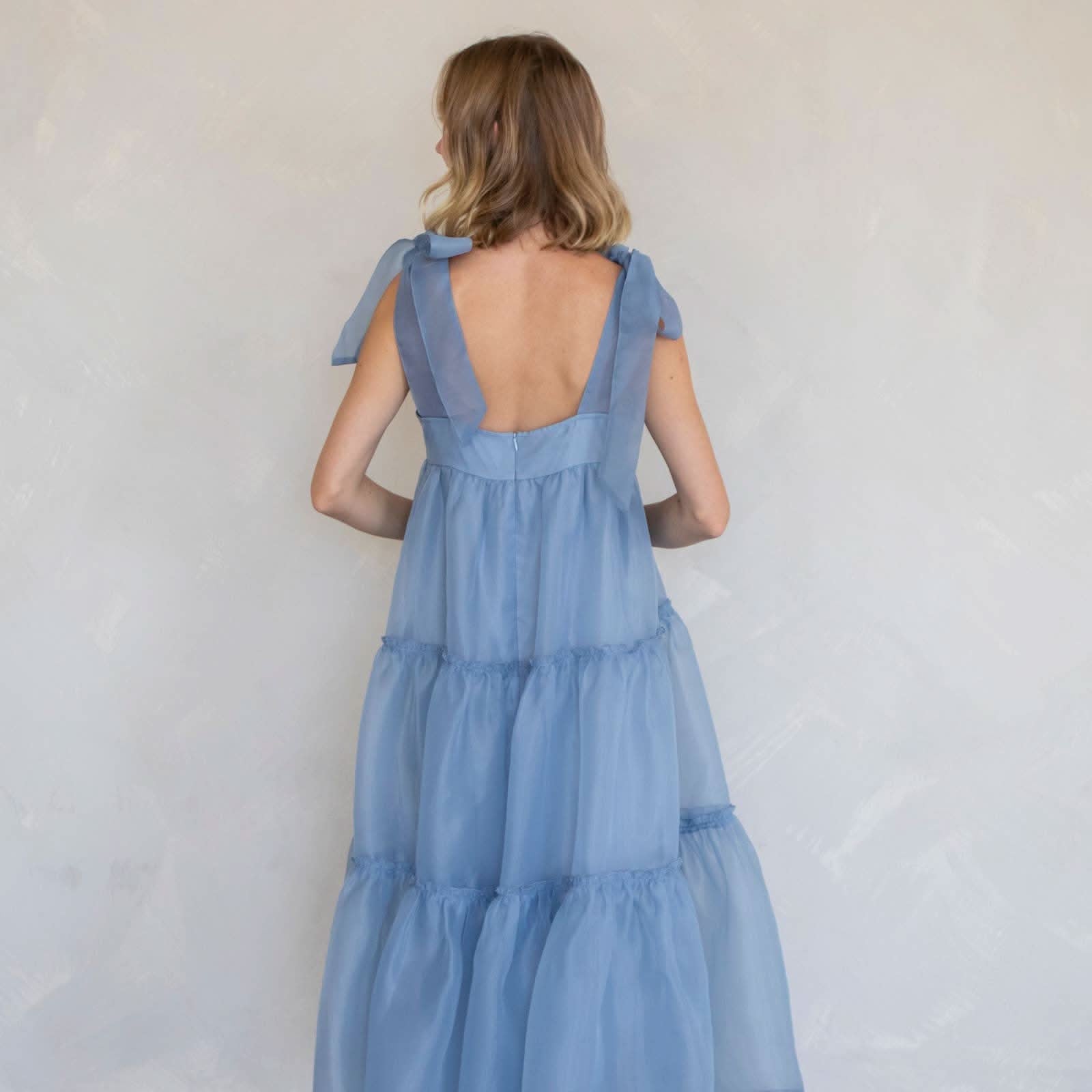 Ella Maxi Bow Strap Dress Woman wearing a blue dress