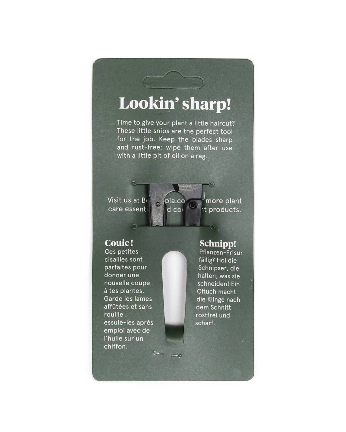 Packaging of hair clippers with text on a white background
