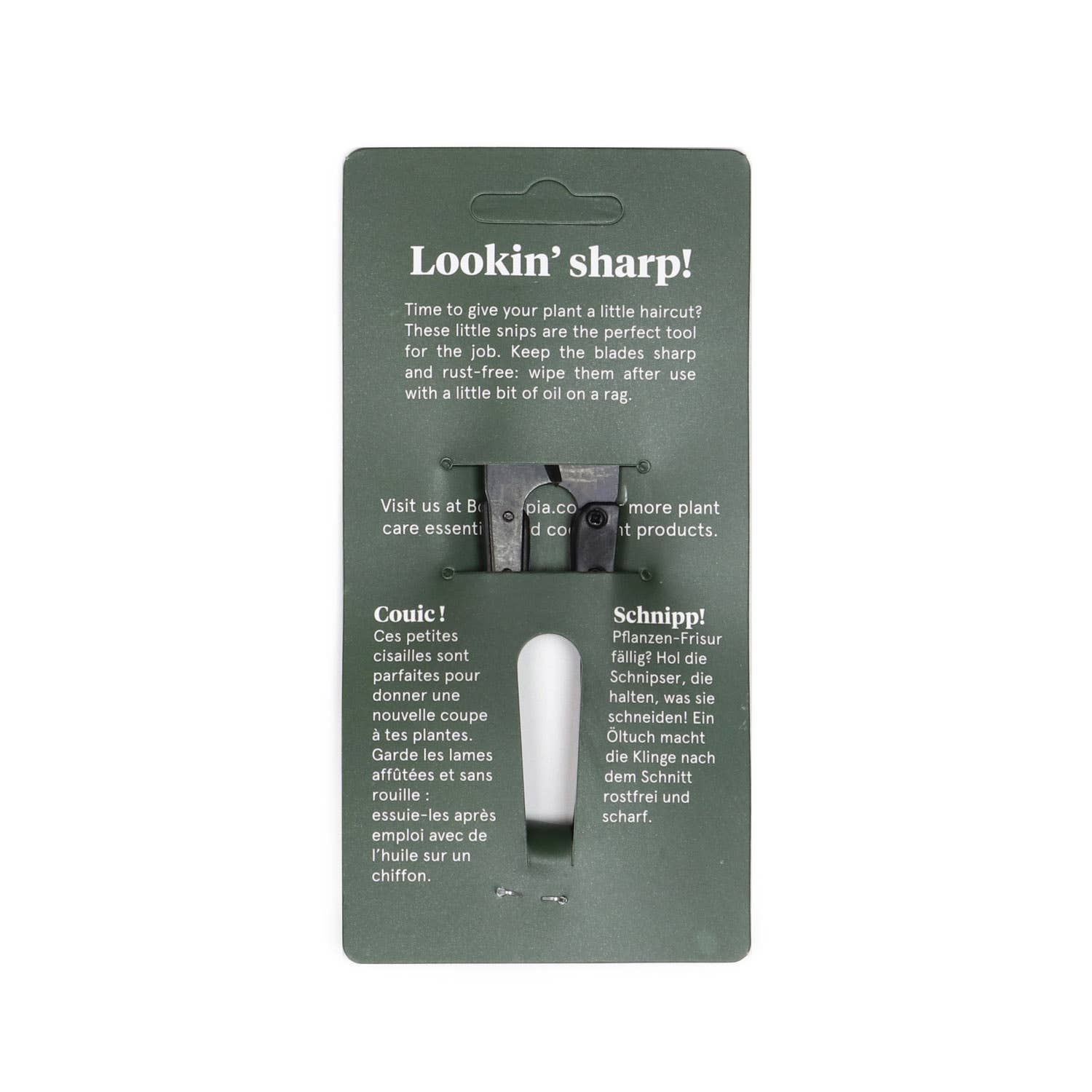 Packaging of hair clippers with text on a white background