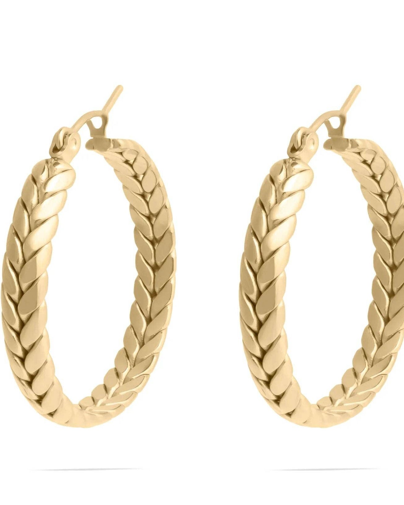 Gold hoop earrings on a white background