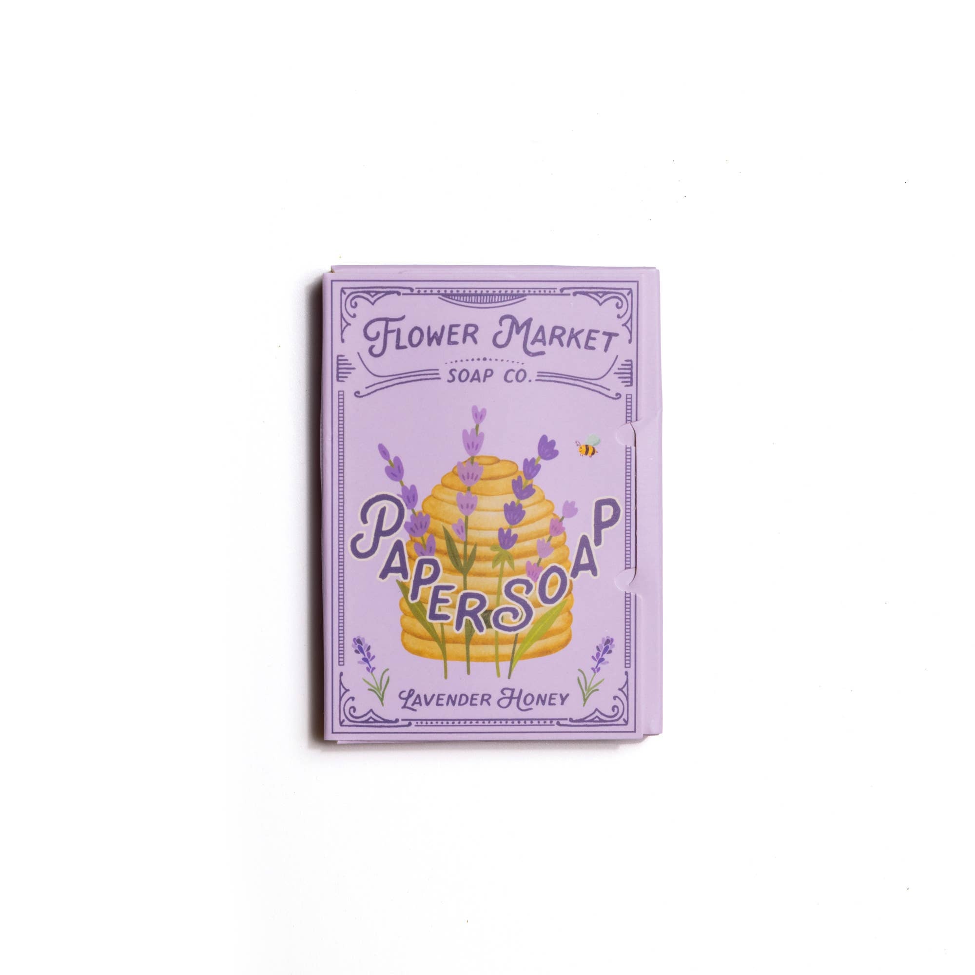 Flower Market Soap Co. lavender honey paper soap packaging on a white background