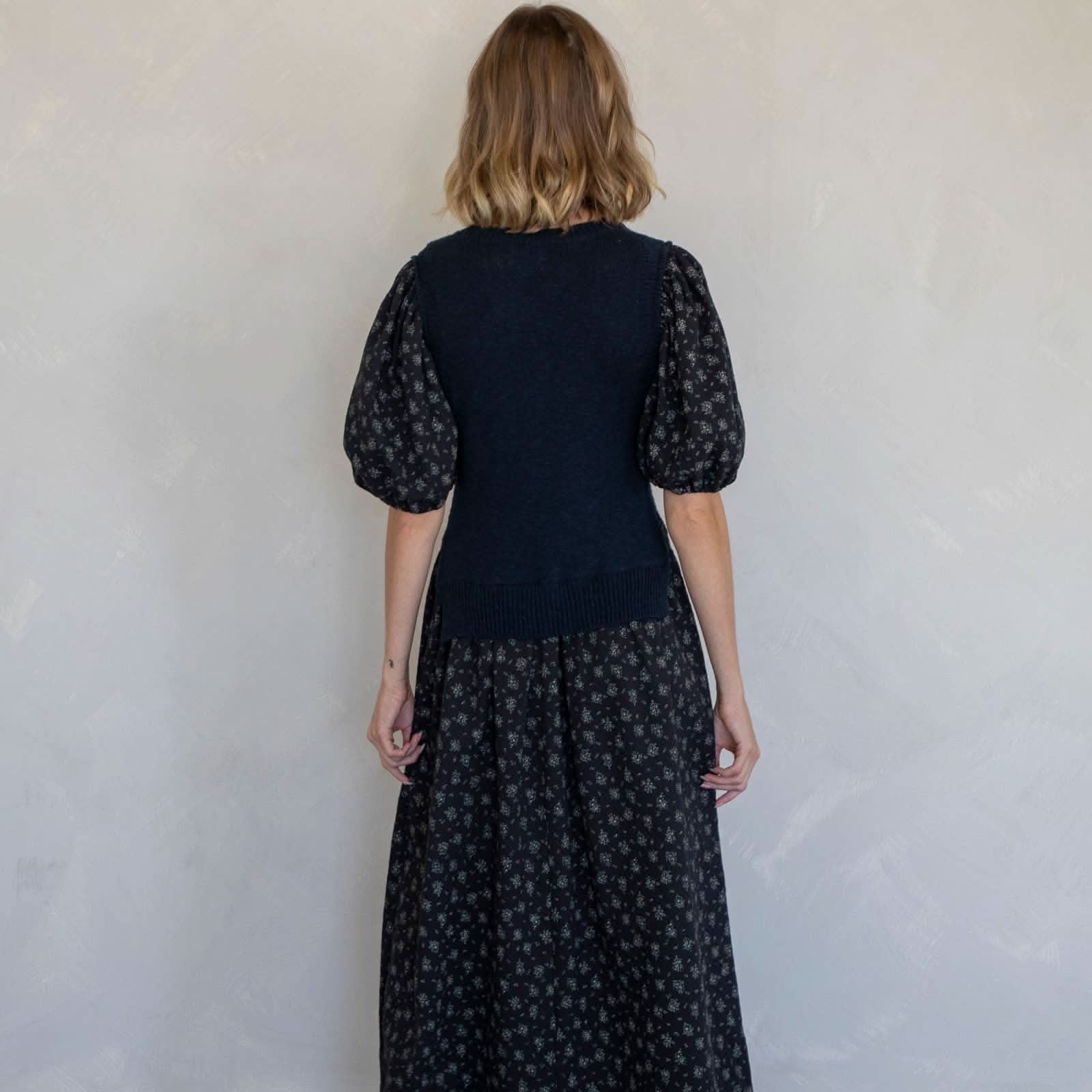 winter wardrobe with our versatile midi sweater vest dress