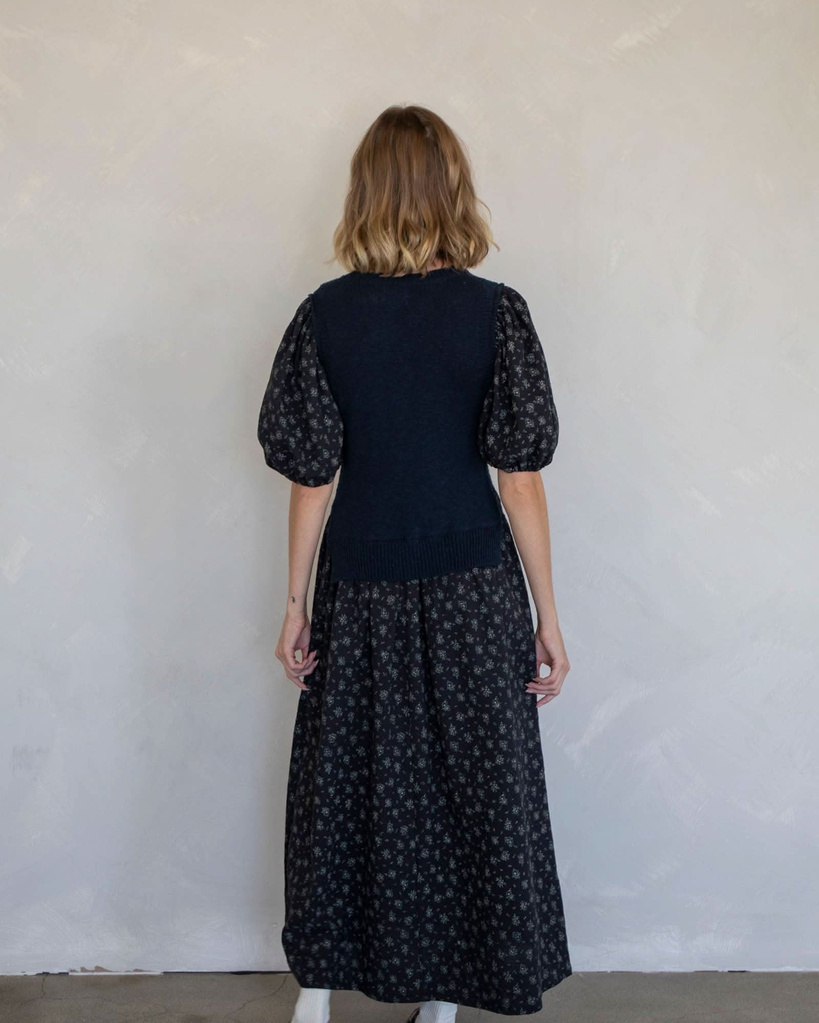 winter wardrobe with our versatile midi sweater vest dress