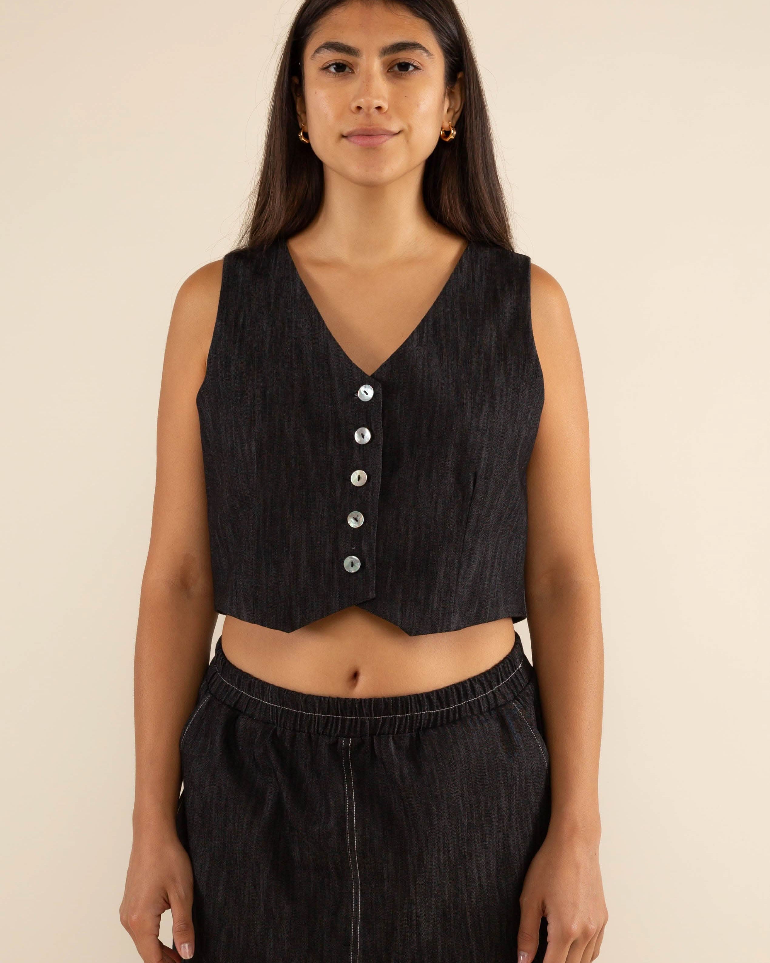 Laney Black Denim Vest by NLT is a classic addition to your wardrobe.