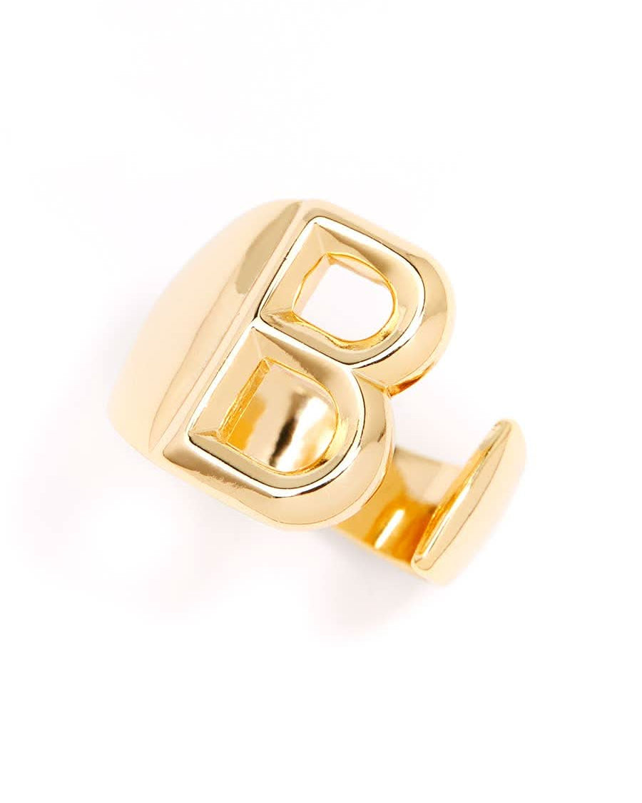 Gold adjustable letter ring on white background in letter B