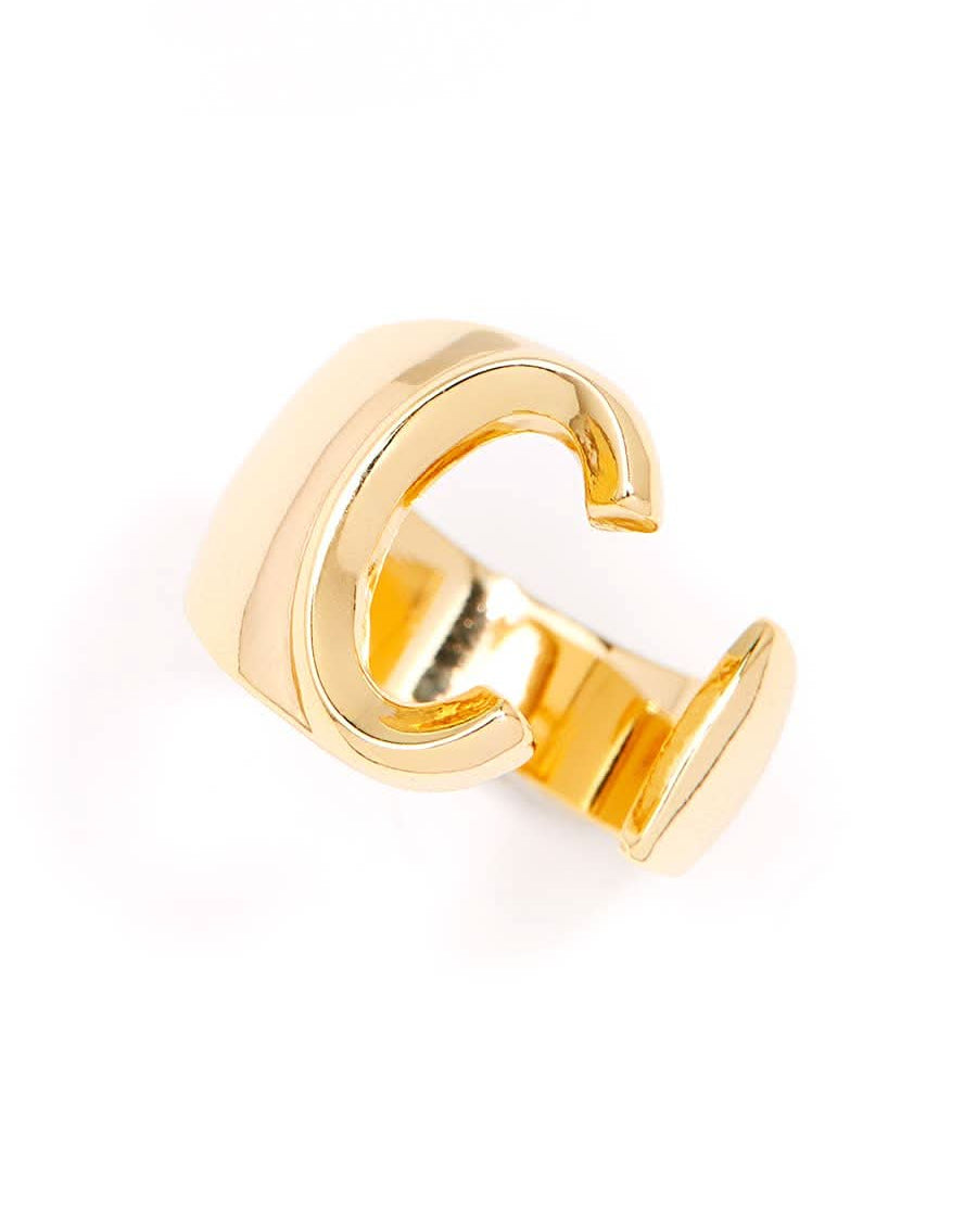 Gold adjustable letter ring on white background in letter C