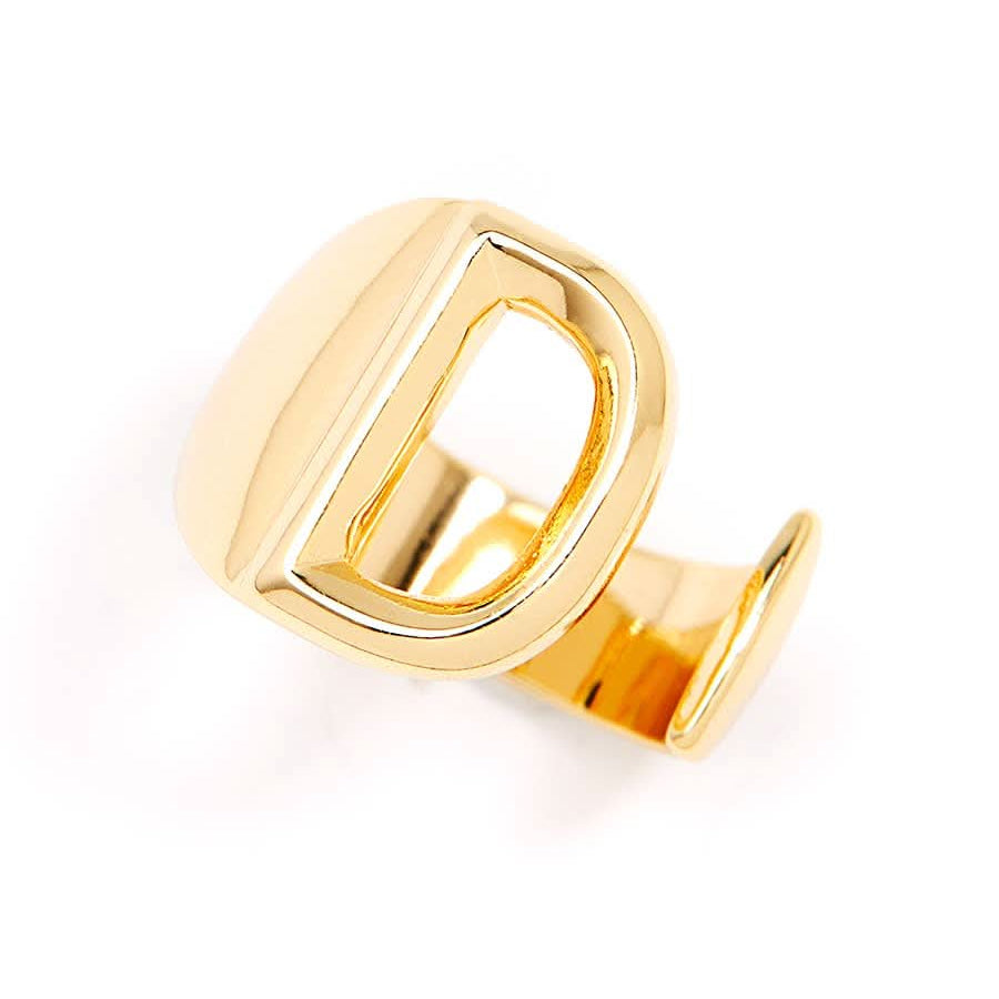 Gold adjustable letter ring on white background in letter D