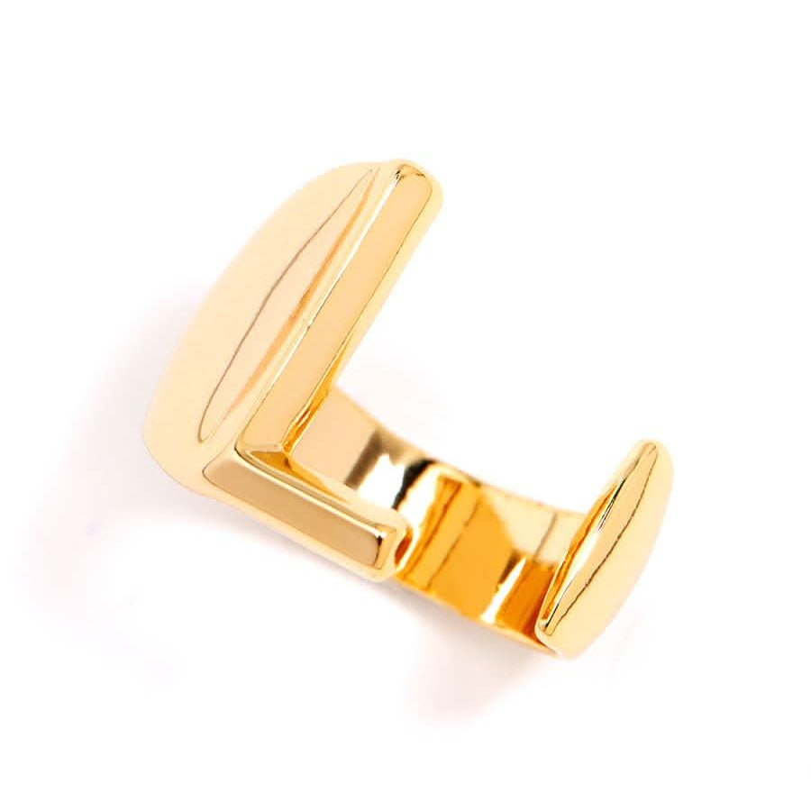 Gold adjustable letter ring on white background in letter L