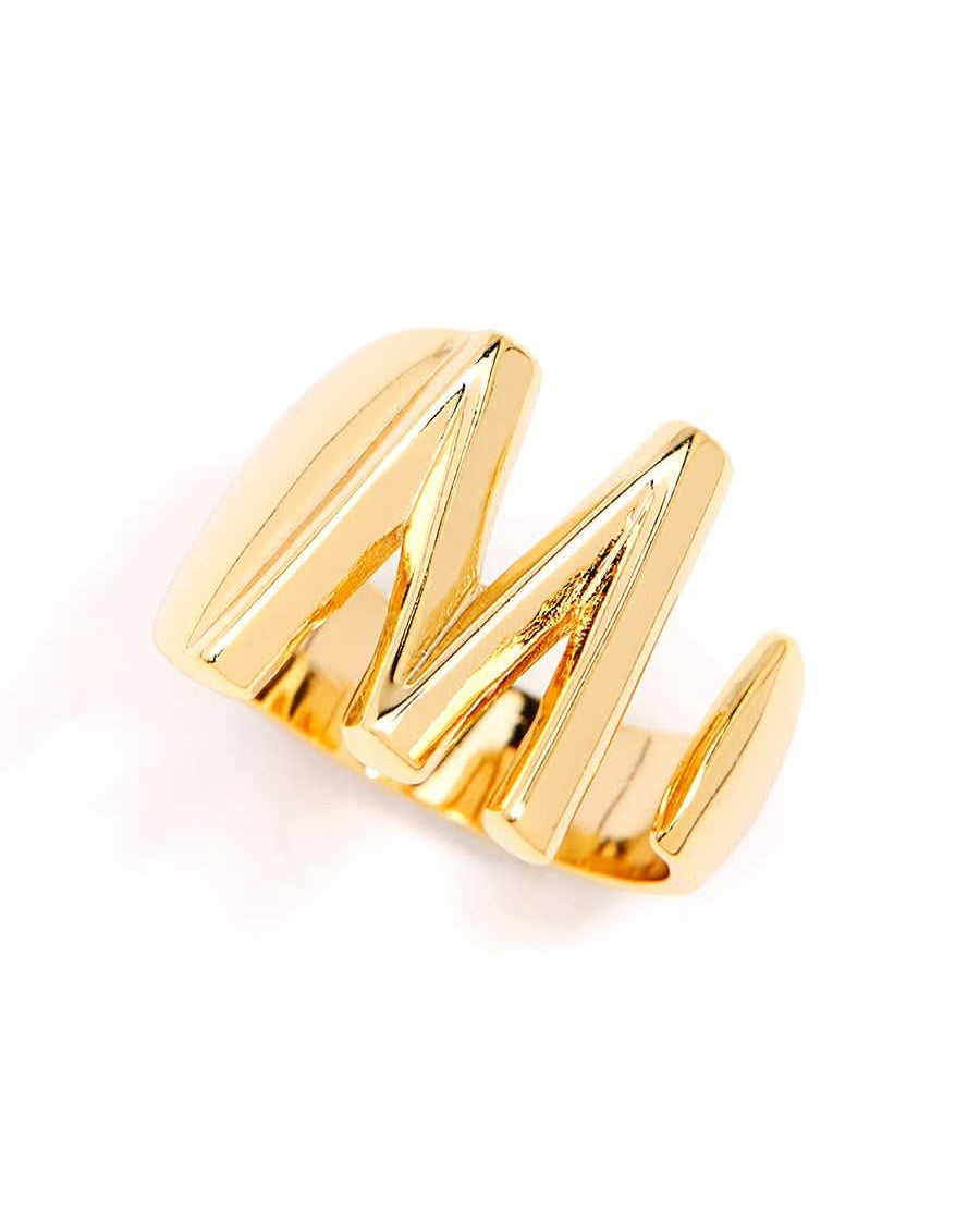 Gold adjustable letter ring on white background in letter M