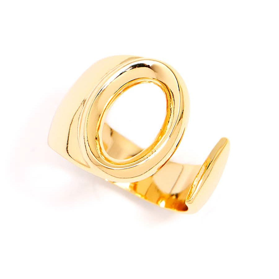 Gold adjustable letter ring on white background in letter O