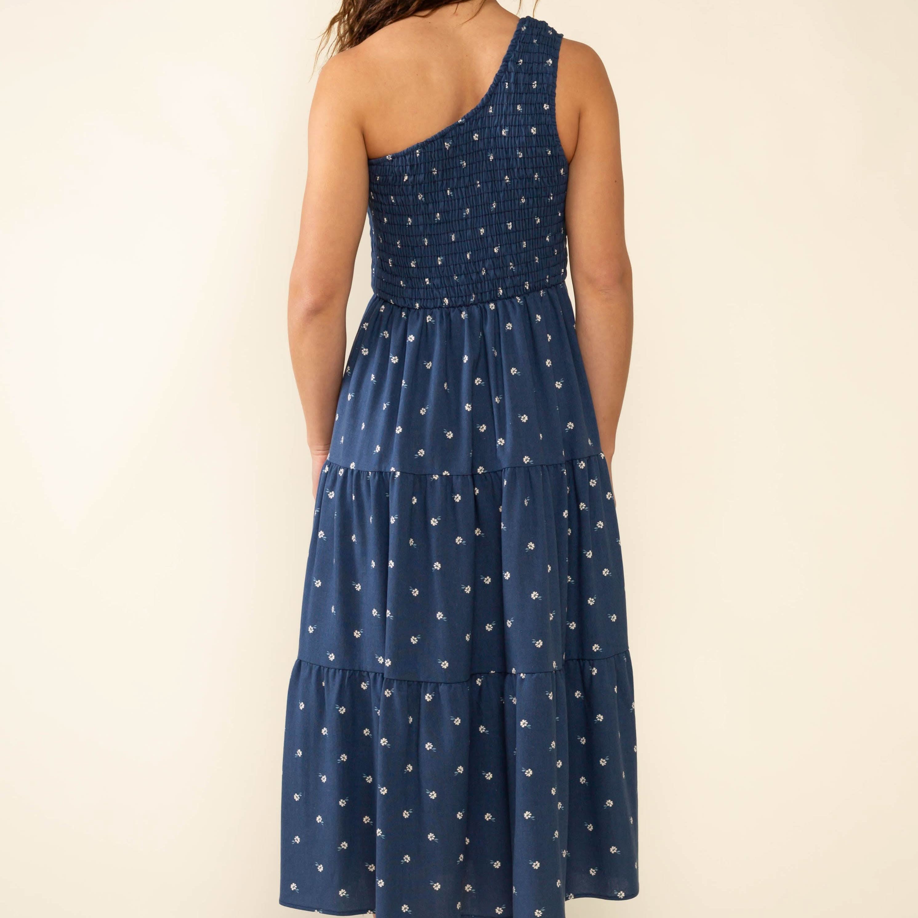 Luna One Shoulder Midi Dress Woman wearing a blue polka dot dress