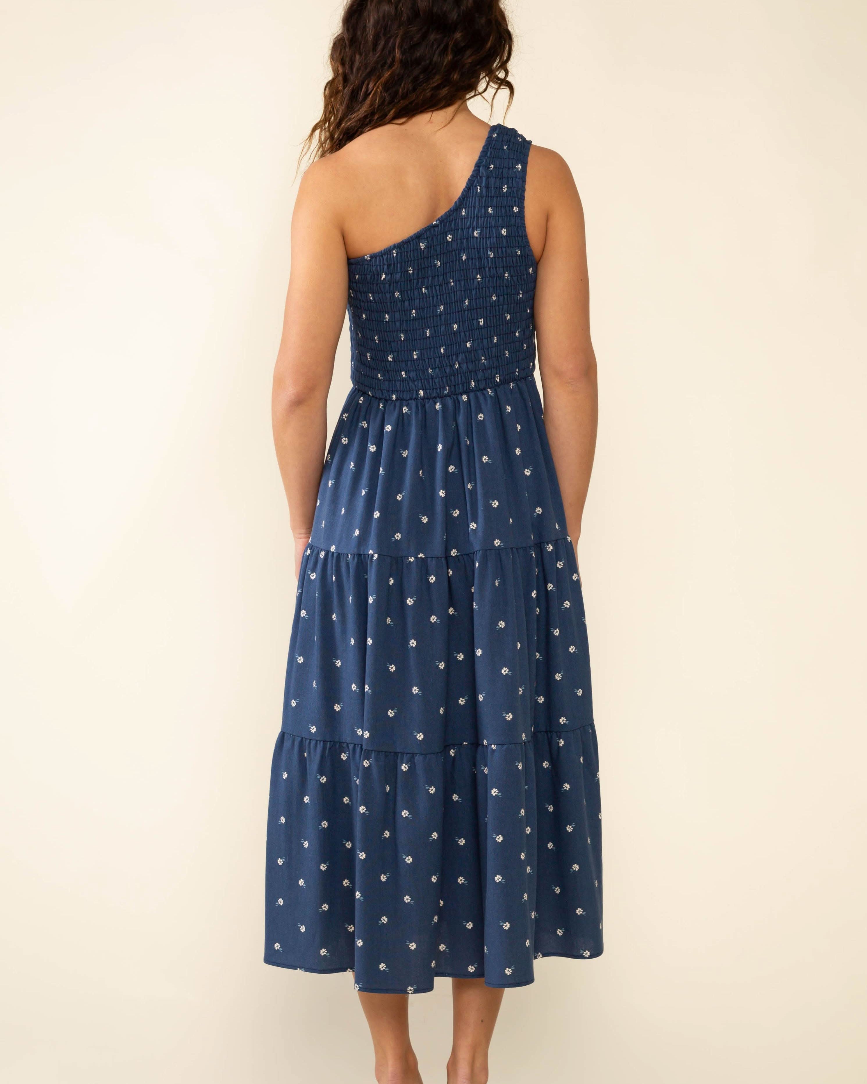 Luna One Shoulder Midi Dress Woman wearing a blue polka dot dress