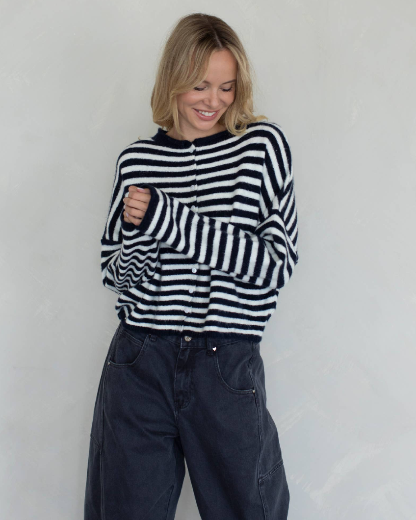 Person wearing a black and white striped sweater
