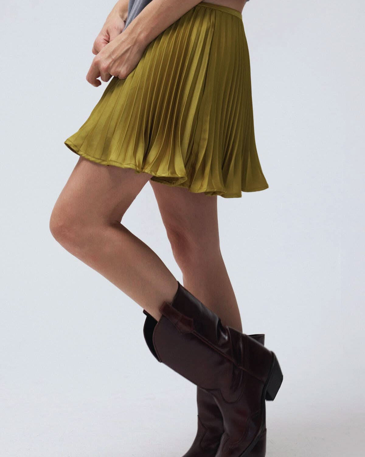 Pleated Satin Mini Skort look of a mini skirt with the comfort of built-in shorts,