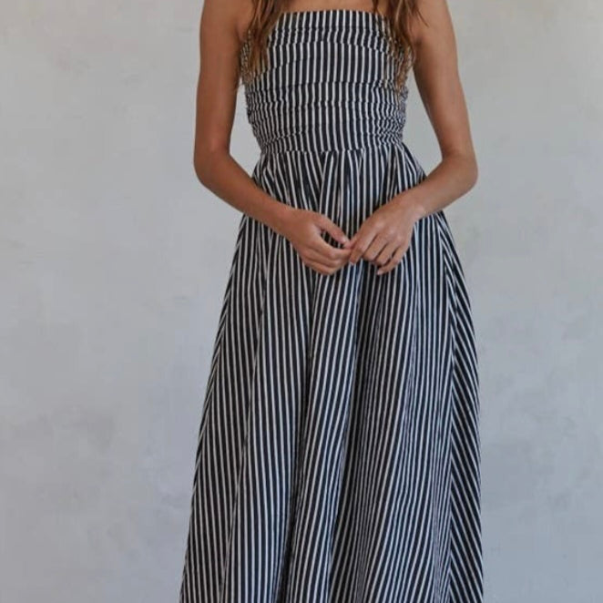Promenade Maxi Dress Woman wearing a black and white striped dress