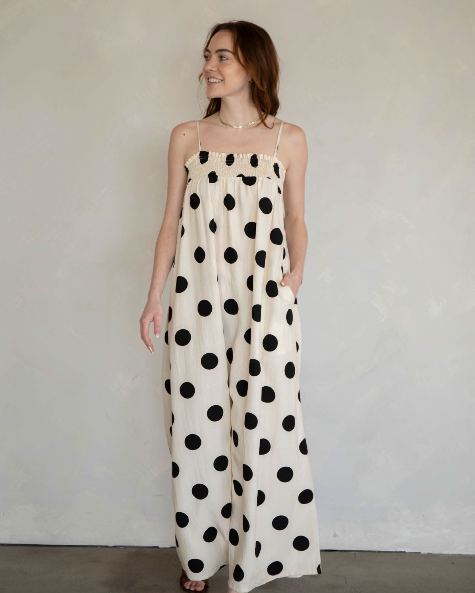 Cream Sandy Polka Dot Maxi Dress Woman wearing a polka dot dress