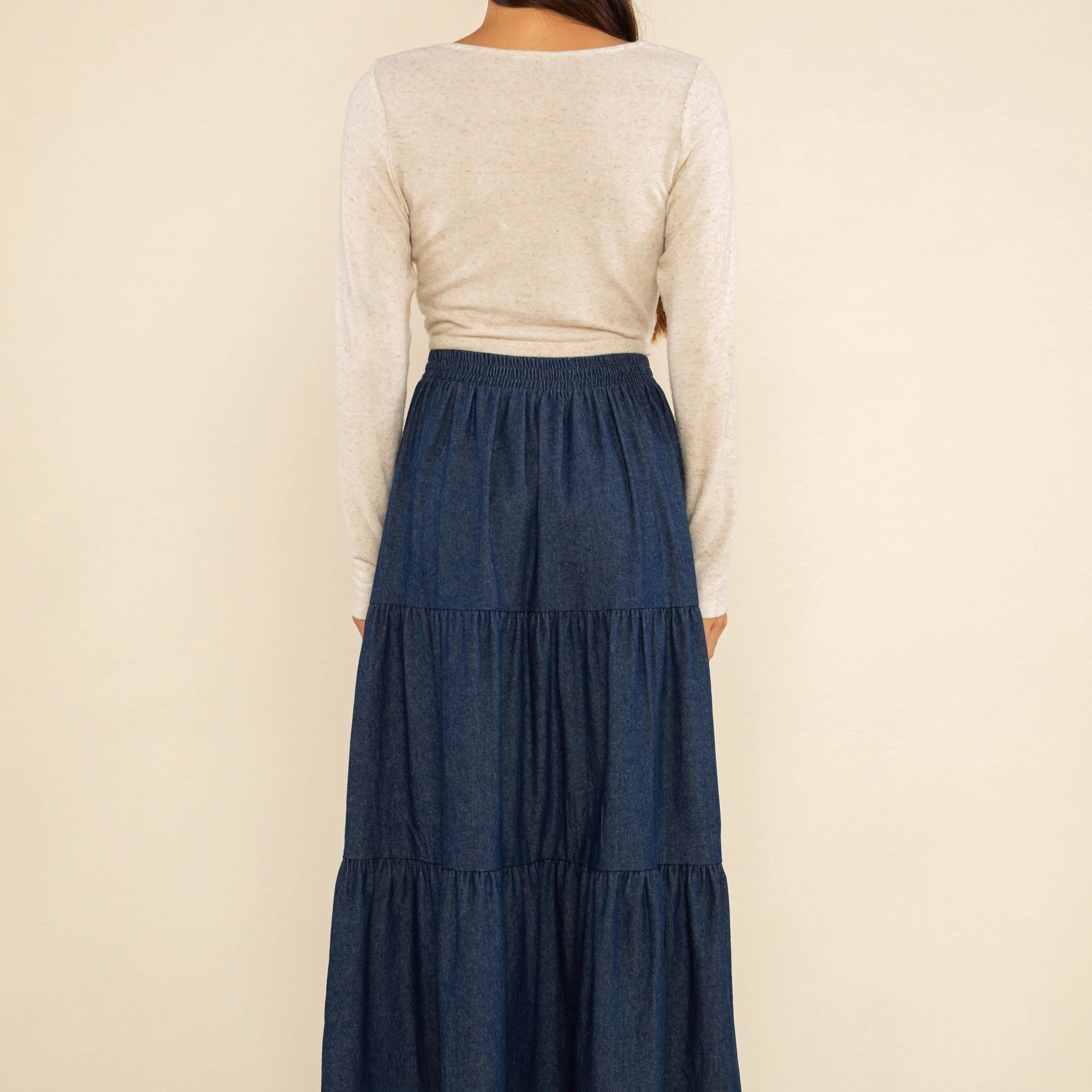 long navy tiered skirt It’s a versatile, stylish item that will make a statement in any collection