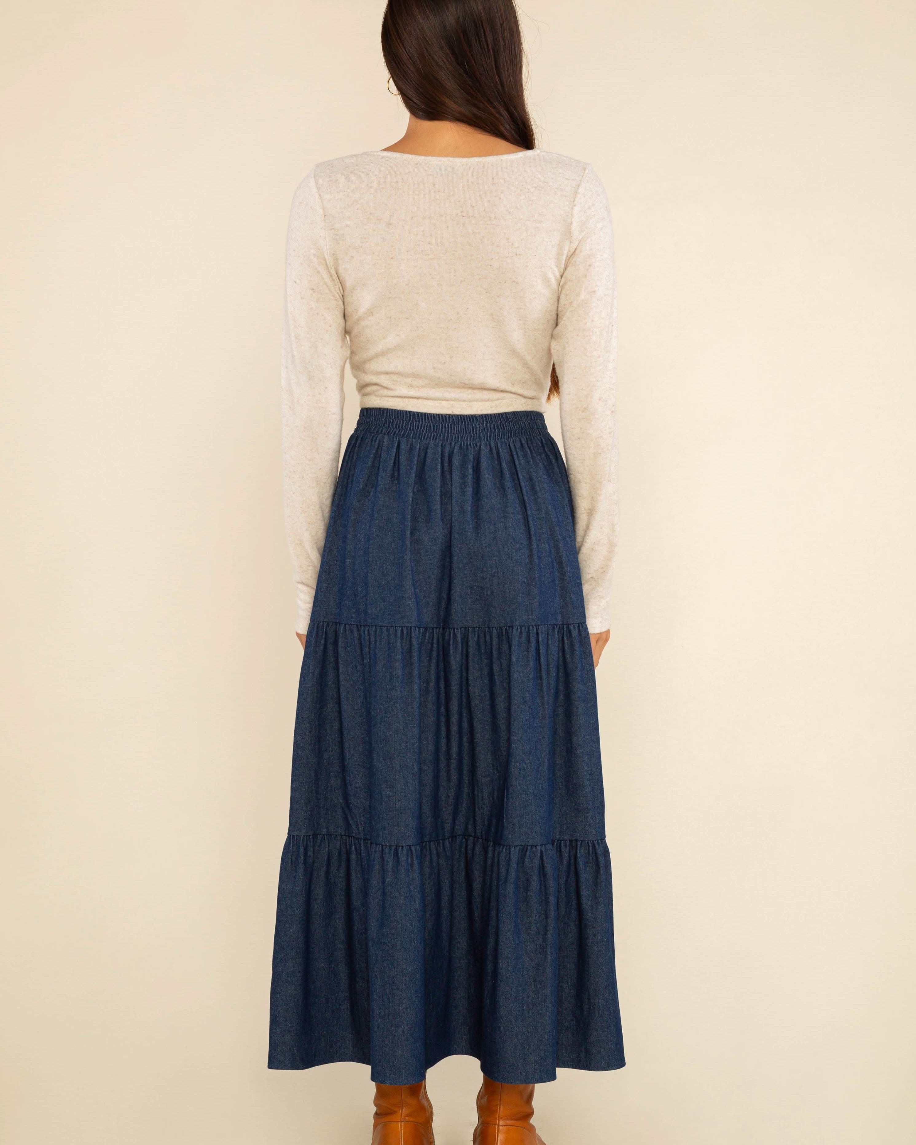 long navy tiered skirt It’s a versatile, stylish item that will make a statement in any collection