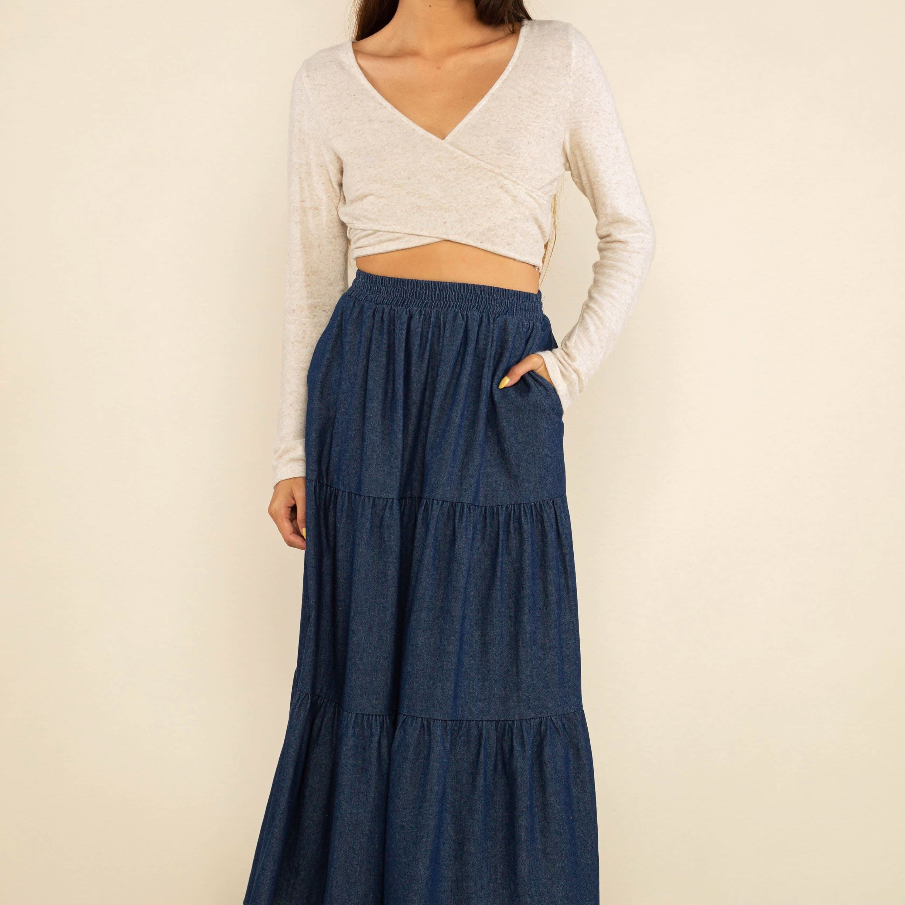 Woman wearing a blue tiered skirt with elastic waist