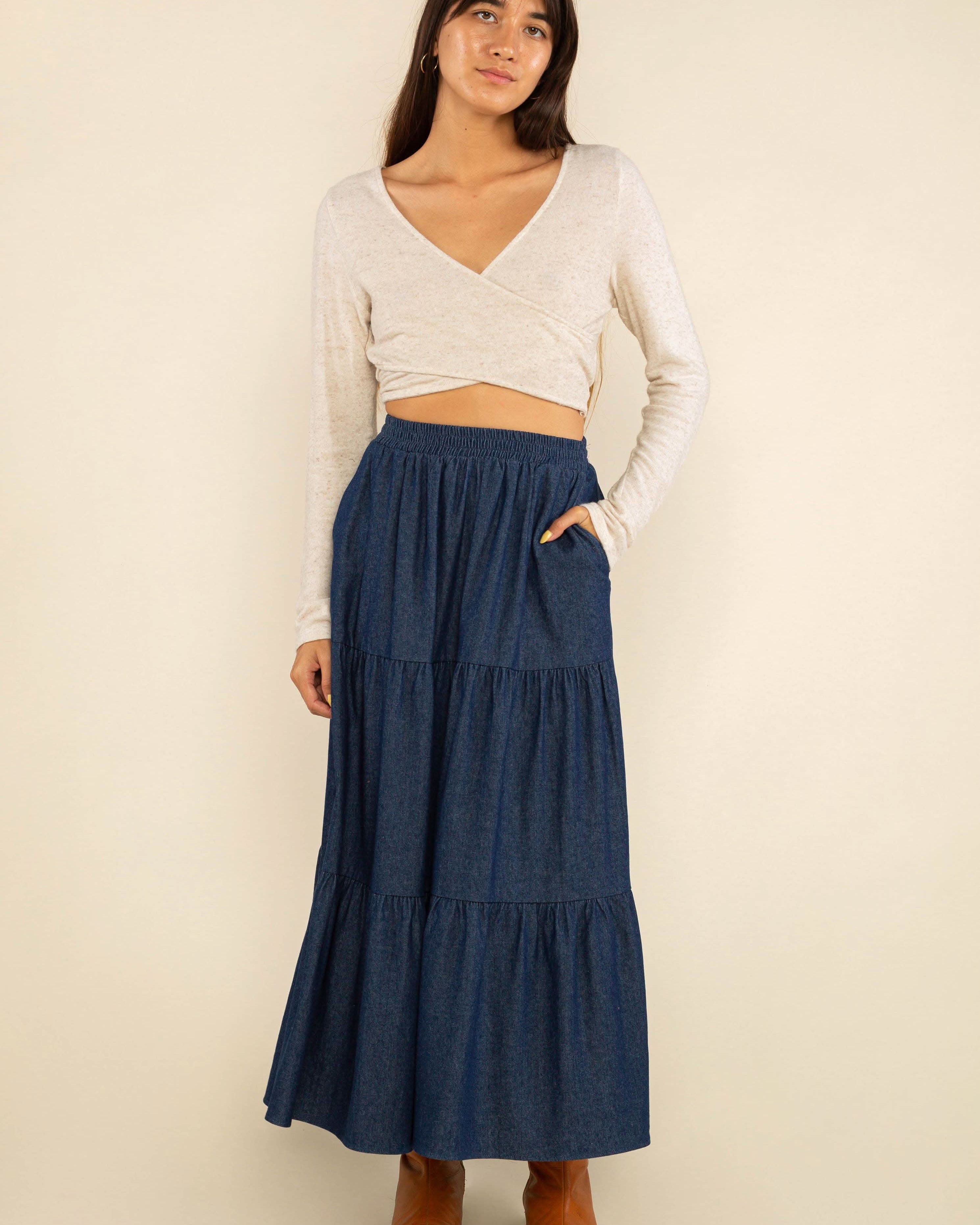 Woman wearing a blue tiered skirt with elastic waist