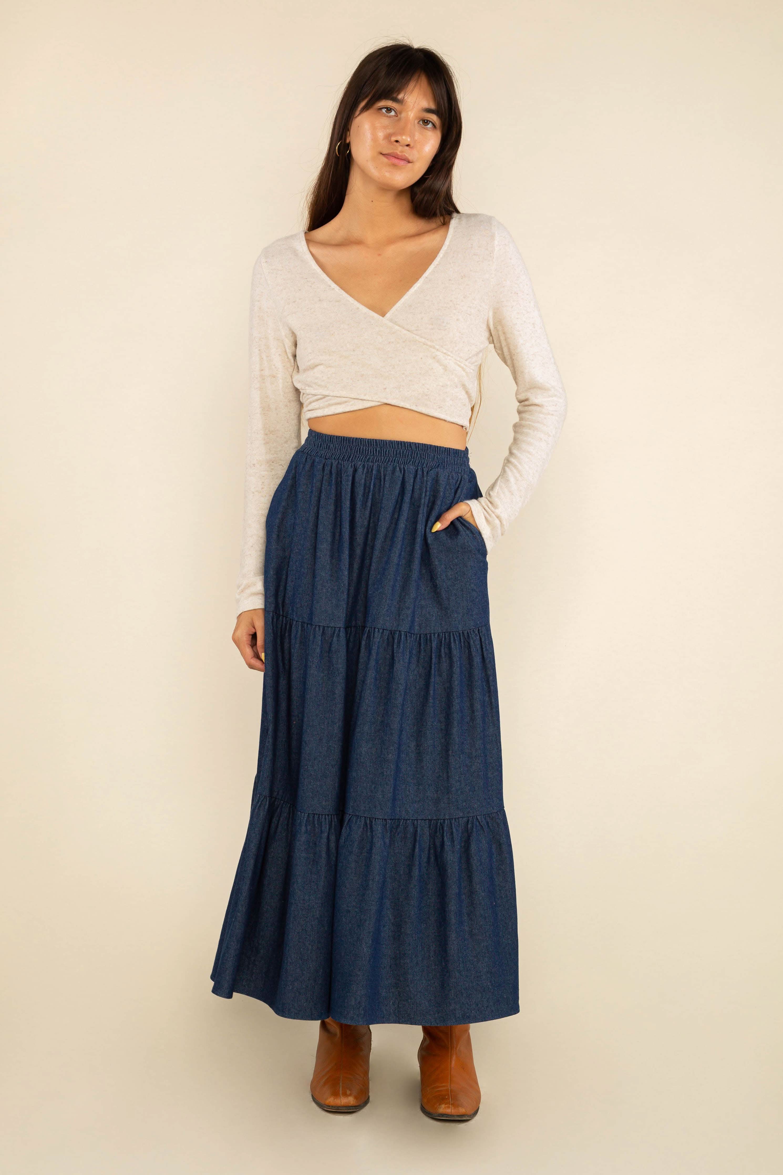 Woman wearing a blue tiered skirt with elastic waist