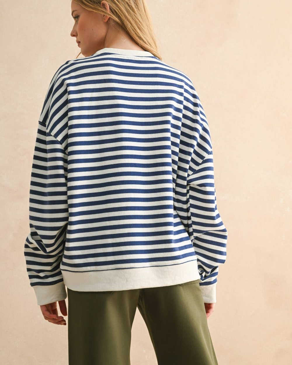 while the red and heather grey stripes add visual interest to your everyday rotation.