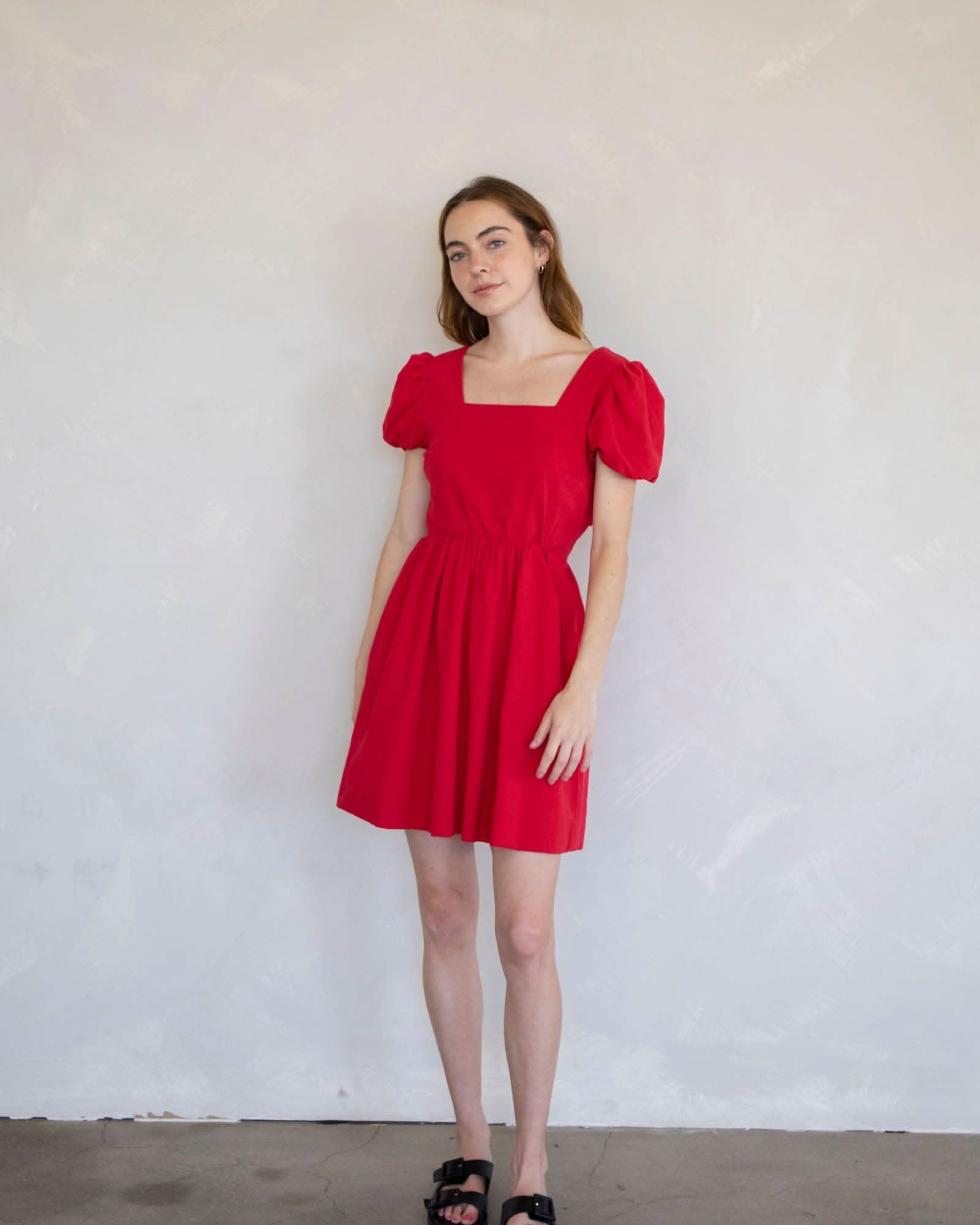 Violet Mini Dress Woman wearing a red dress Form and content