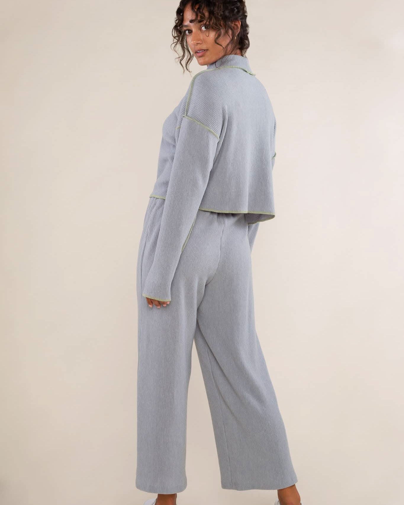 cropped turtleneck top features delicate pleats and contrasting