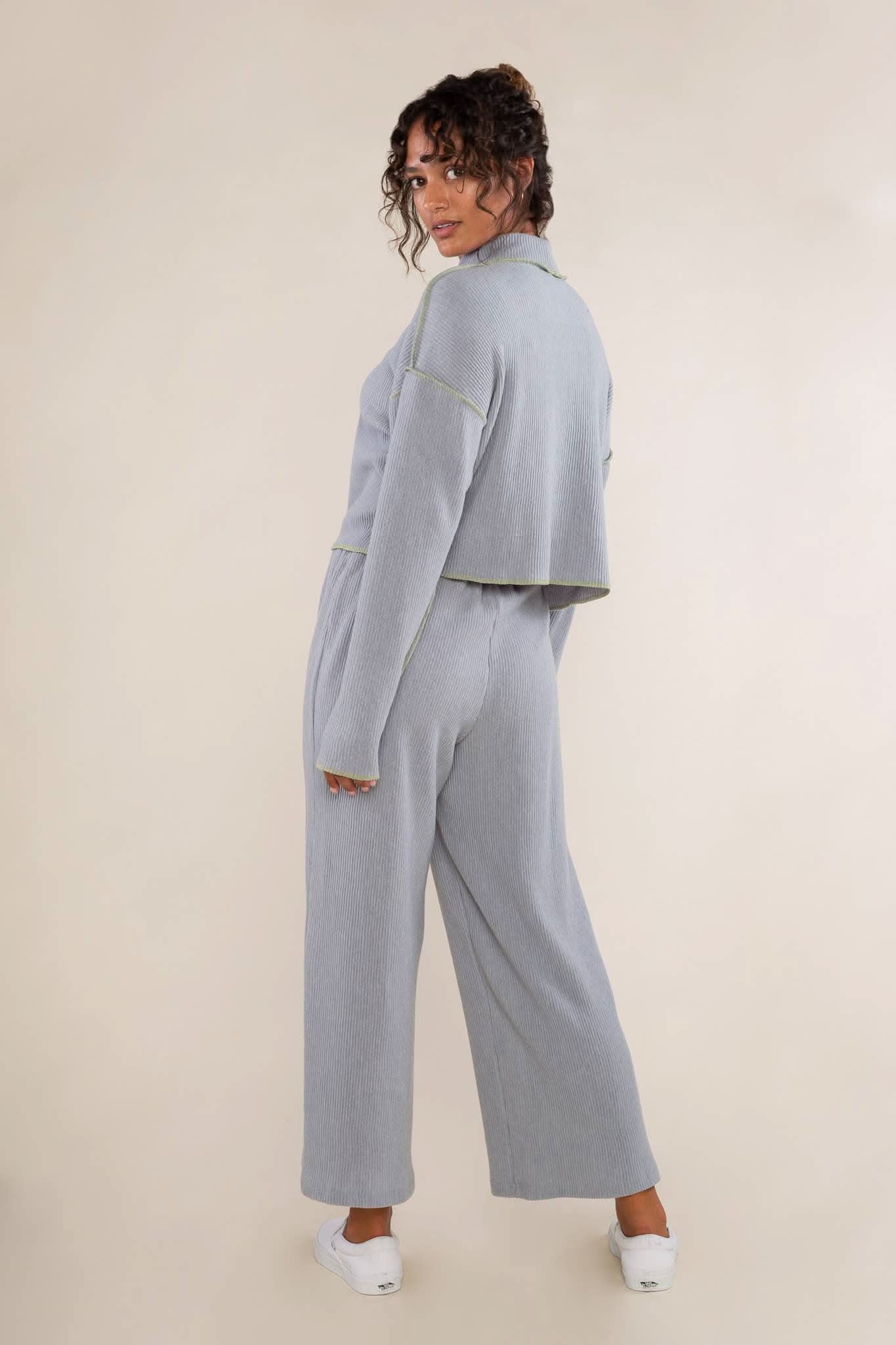 cropped turtleneck top features delicate pleats and contrasting