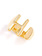 Gold adjustable letter ring on white background in letter H