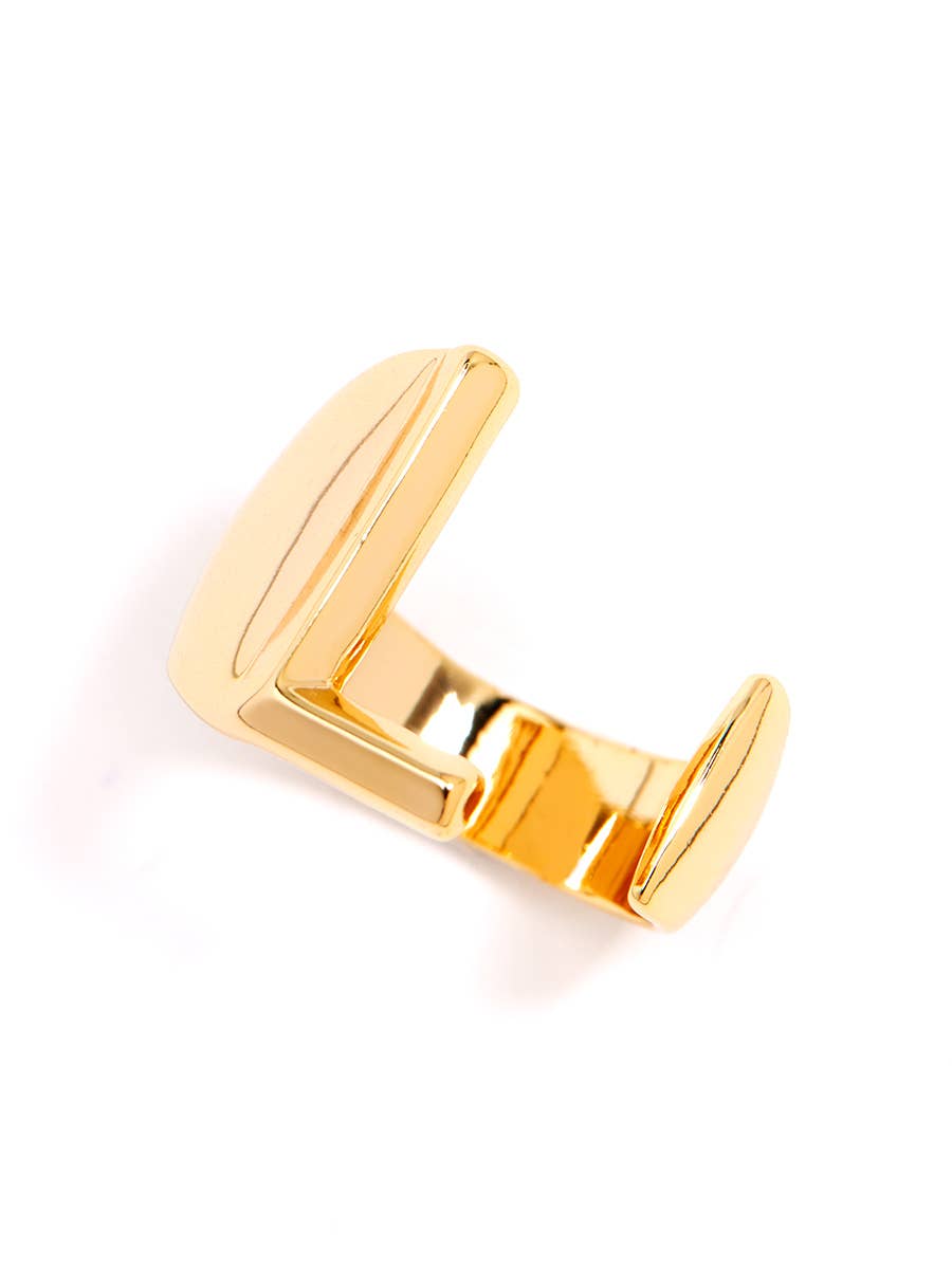 Gold adjustable letter ring on white background in letter L