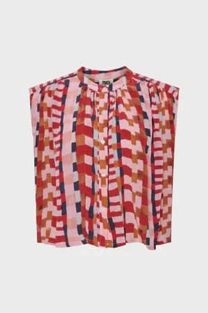 Wide cropped breezy sleeveless blouse with bold geometric print in lively shades of red, pink, orange, and blue