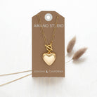 gold 90's puffed heart necklace on stand