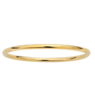 Simple thin gold ring for stacking laying on a white background 