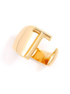 Gold adjustable letter ring on white background in letter T